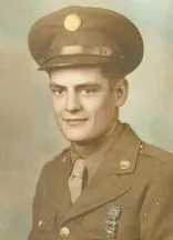 Portrait of a young man in a military uniform